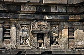 Prambanan - Candi Lara Jonggrang, kinara-kinari panels a composition of a lion with the tree of heaven and a pair of kinnara. 